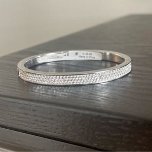 Silver Henri Bendel locking bangle